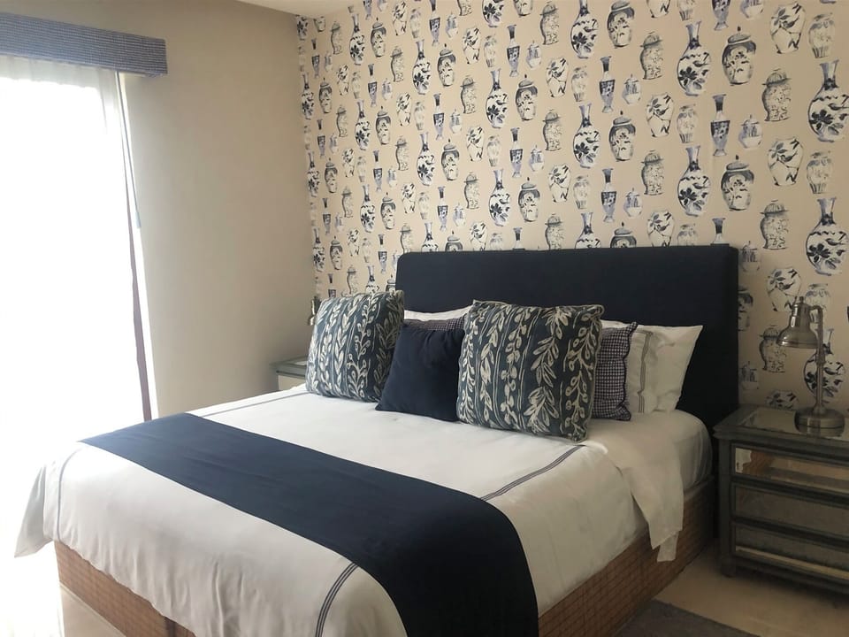 Downstairs has one king bedroom and upstairs has two king rooms.