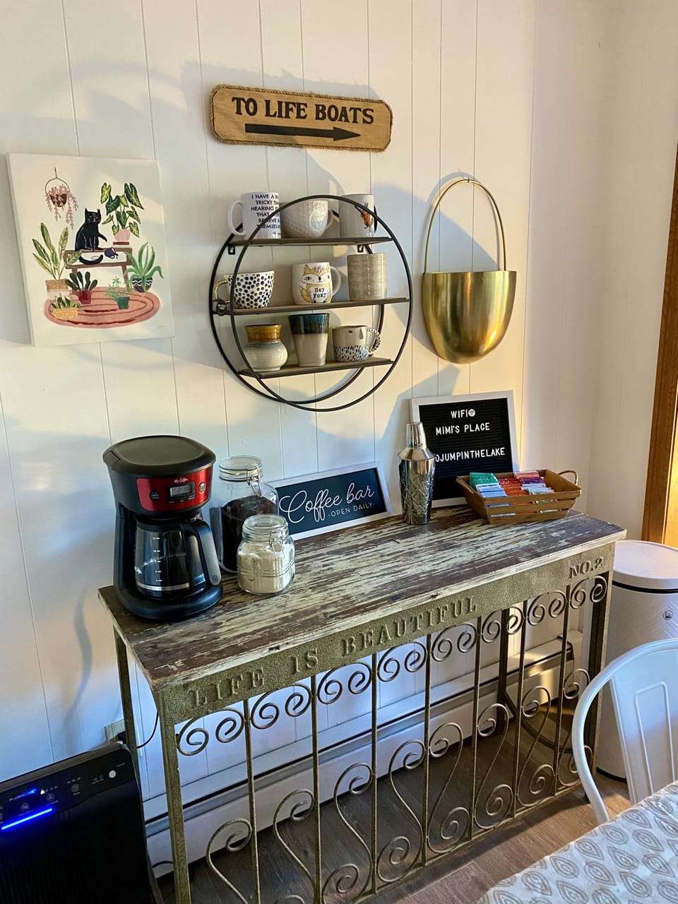 coffee and tea station, complete with Starbucks coffee and some choice mugs.