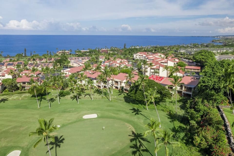 Kona Country Club`s 16th green is visible just off of your lanai.
