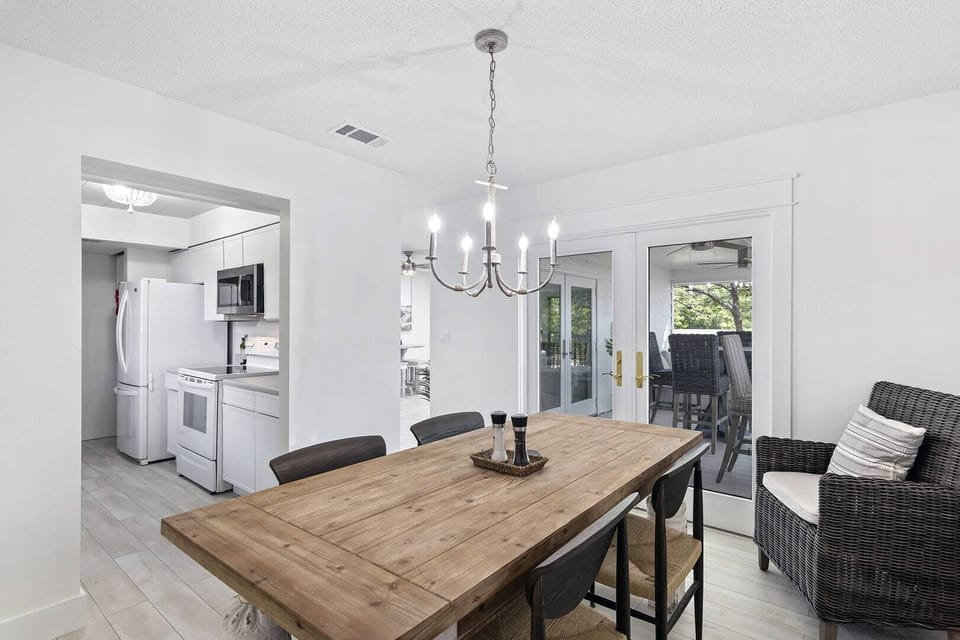 Clean, modern dining area connected to the kitchen for effortless hosting.

