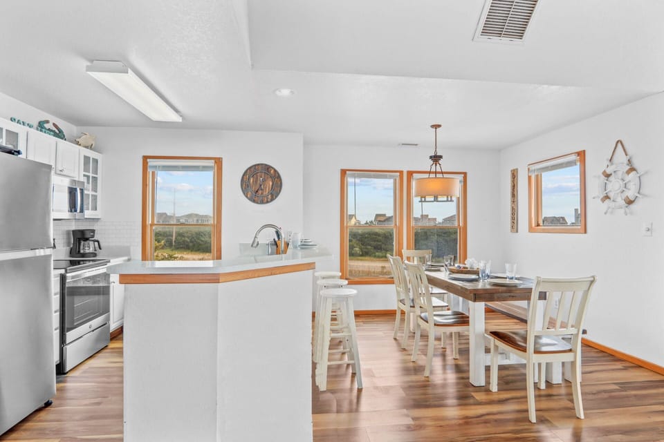 A breathtaking great room with seamless access to a private deck, perfect for indoor-outdoor living.