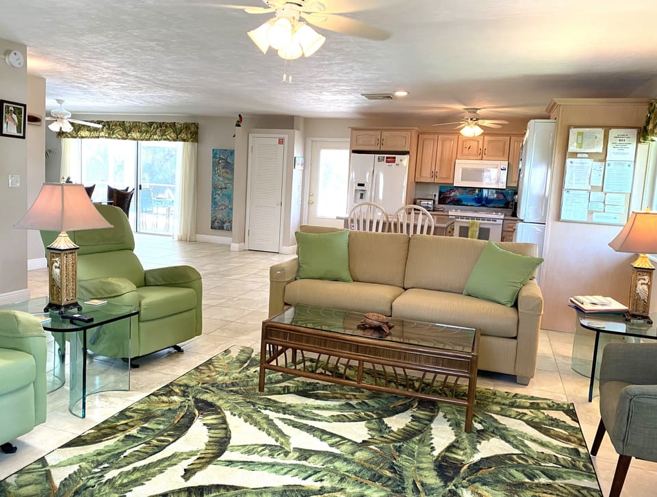 The living room, kitchen and dining room are an open living space.