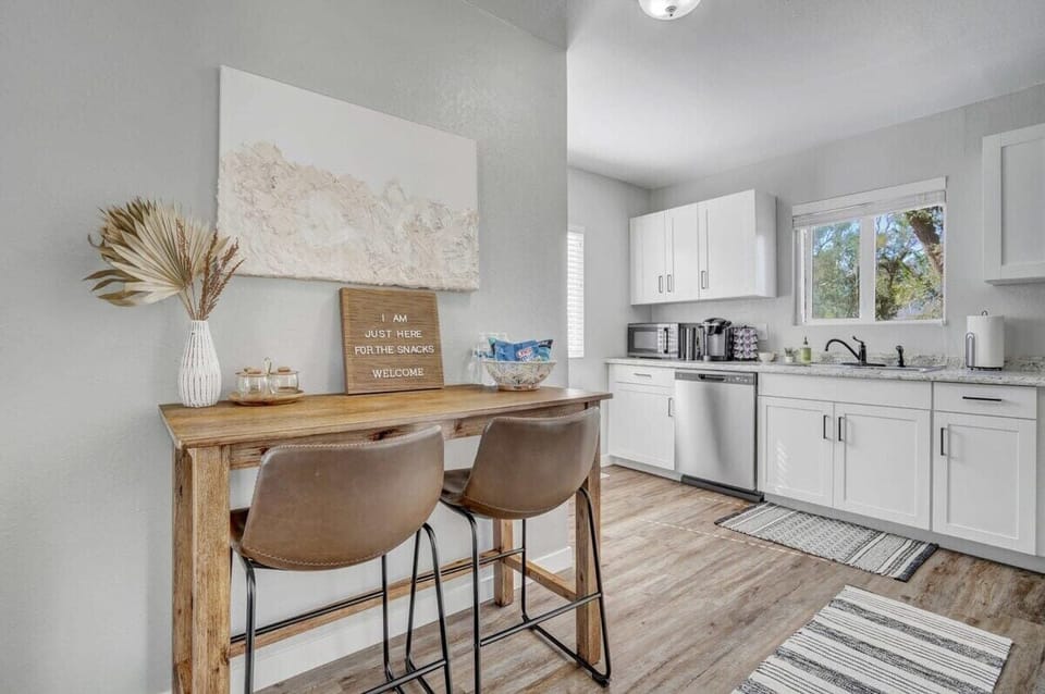 Savor the convenience of a dining table right by the kitchen in our retreat