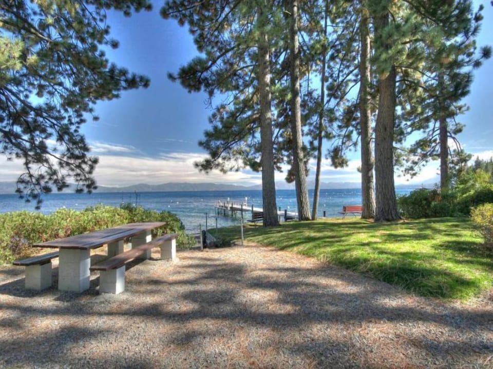 HOA Tahoe Park - Picnic spot by the water w/ benches & scenic lake views through the trees