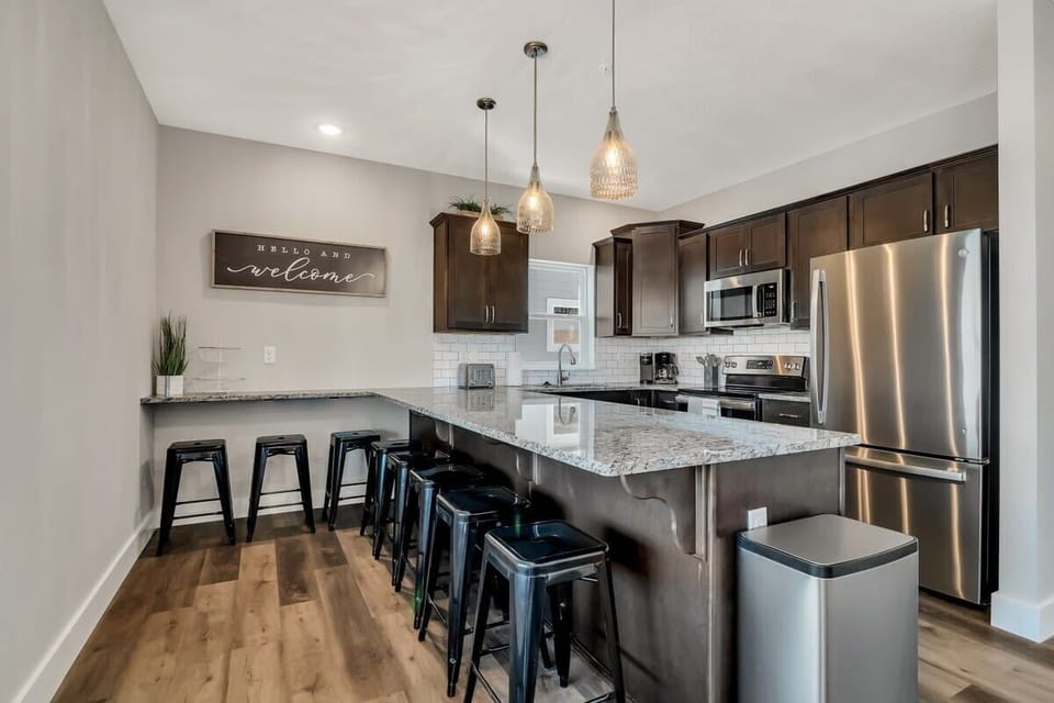 Even extra bar seating around the countertop to keep the cook company!