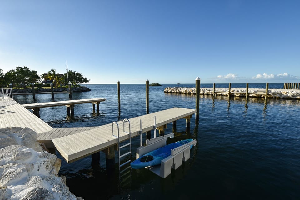2  deep water private finger piers and kayak launch with swim ladder.