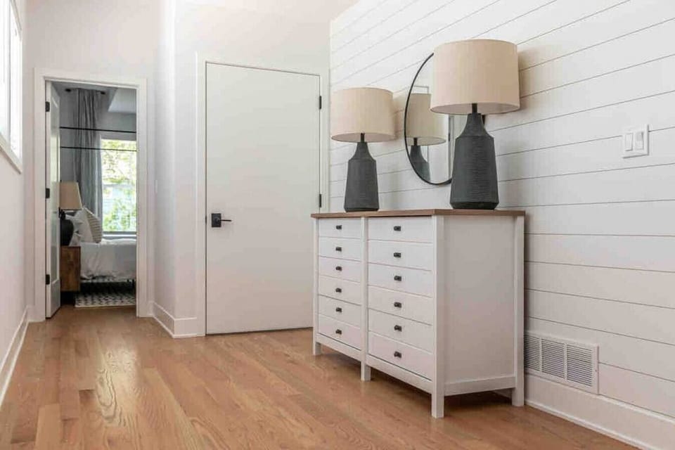 Second floor hallway leads 3 bedroom and to the third floor