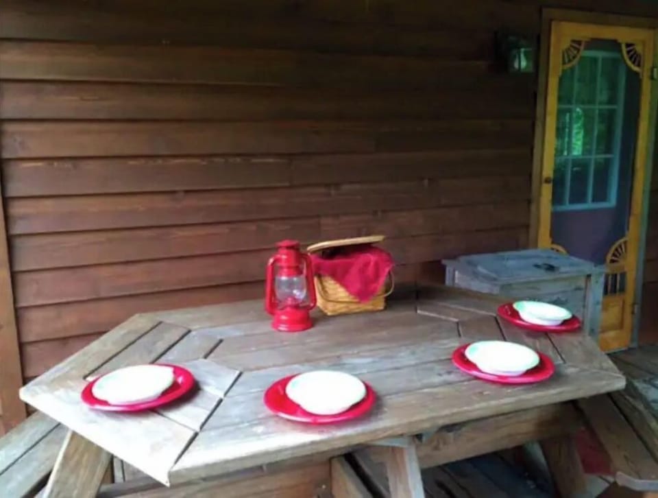 Covered deck table seats 8.   Gas grill (under roof) for your grilling pleasure.
