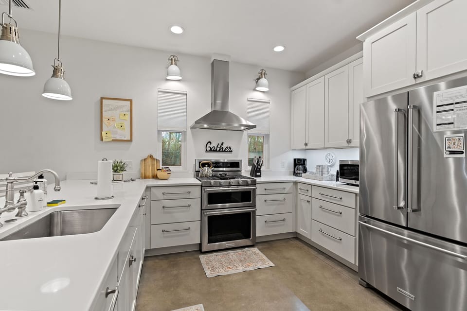 This gorgeous kitchen has all new stainless steel appliances to make your cooking experience trouble-free!