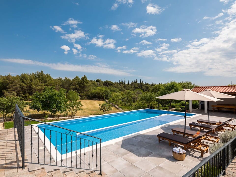 Sky, Cloud, Property, Water, Swimming Pool, Azure, Tree, Shade, Outdoor Furniture, Plant