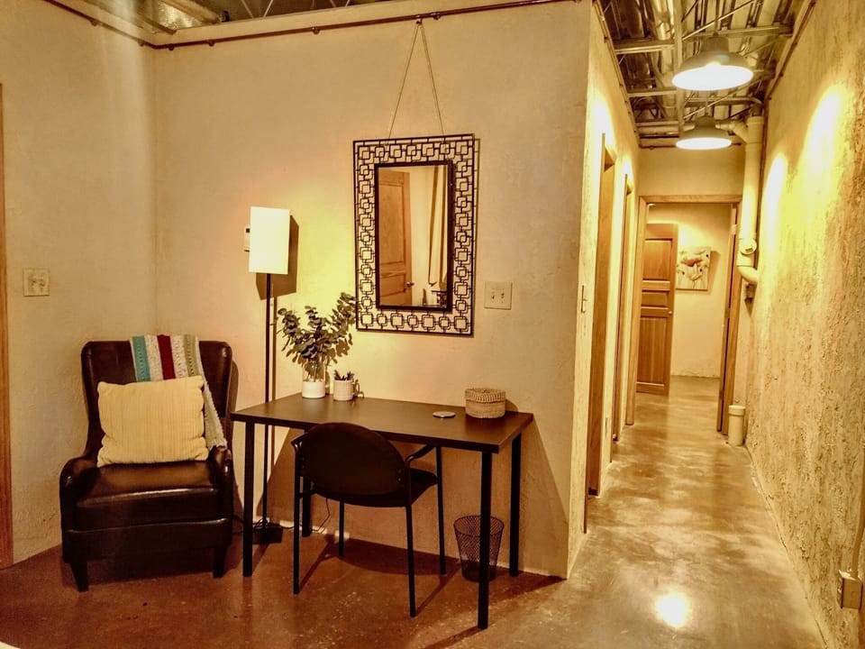 Lower level King bedroom with dedicated workspace. 