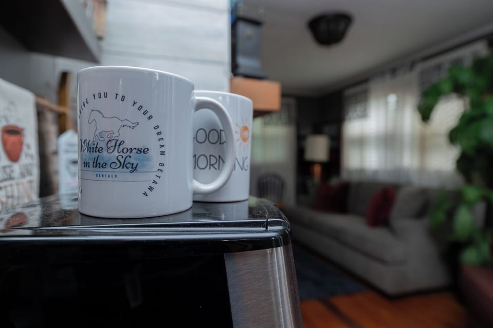"Good morning,"  Enjoy your personal 'Cup of Joe" from our White Horse in the Sky Mugs.