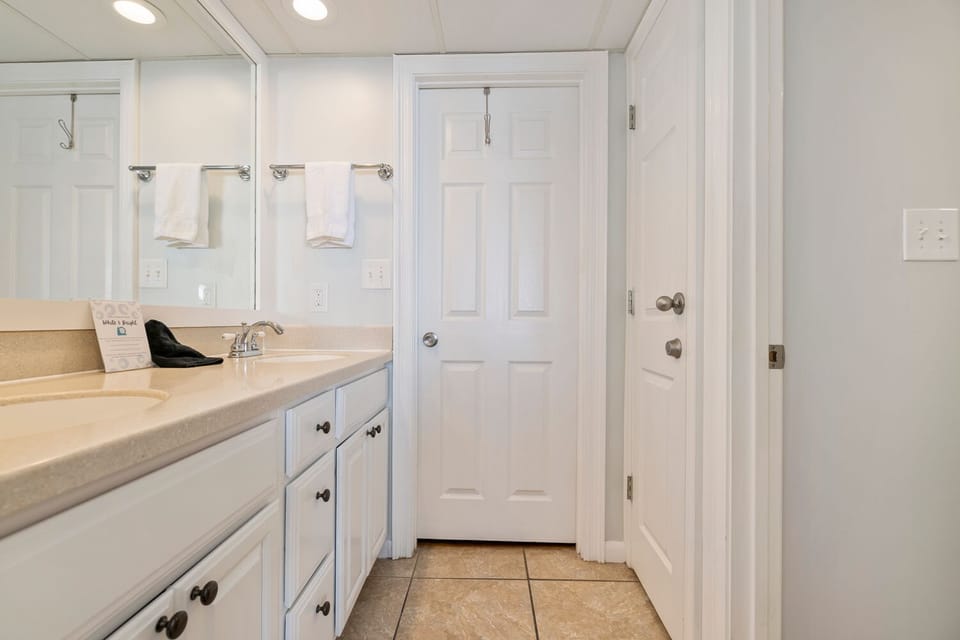 Experience the convenience of the Primary Bedroom’s ensuite bathroom with double-sink vanity.