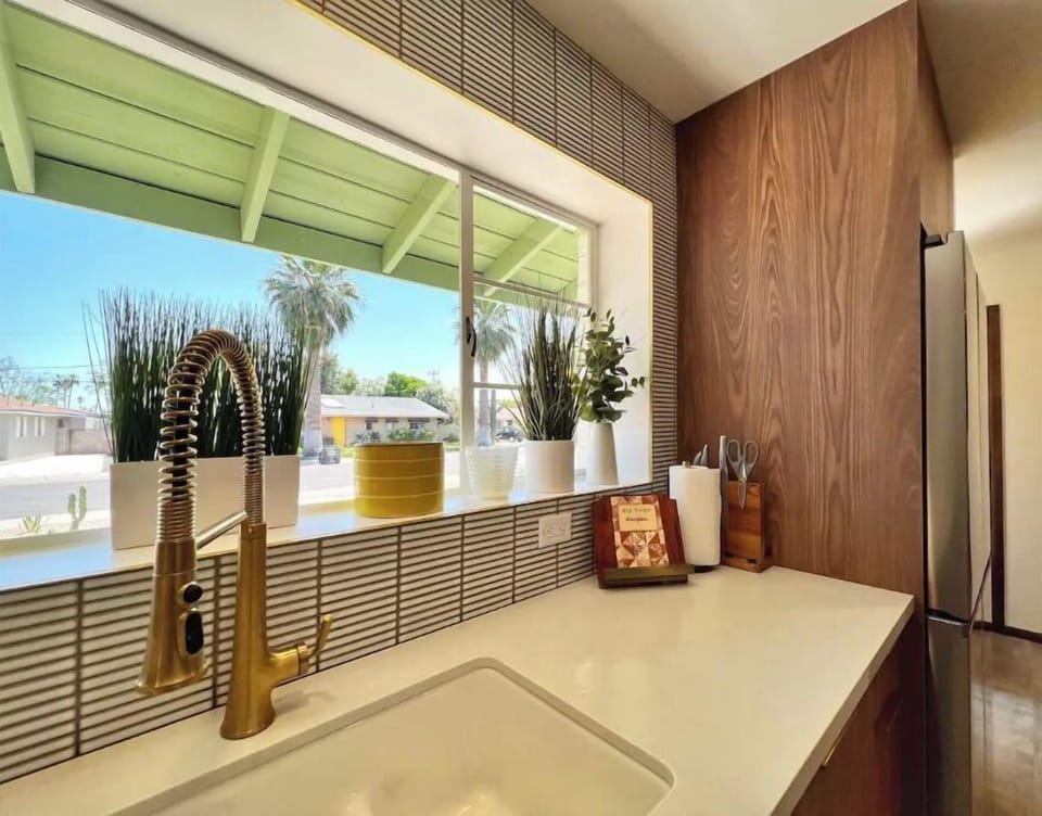 Kitchen - Farmhouse sink and Kohler brass fixtures