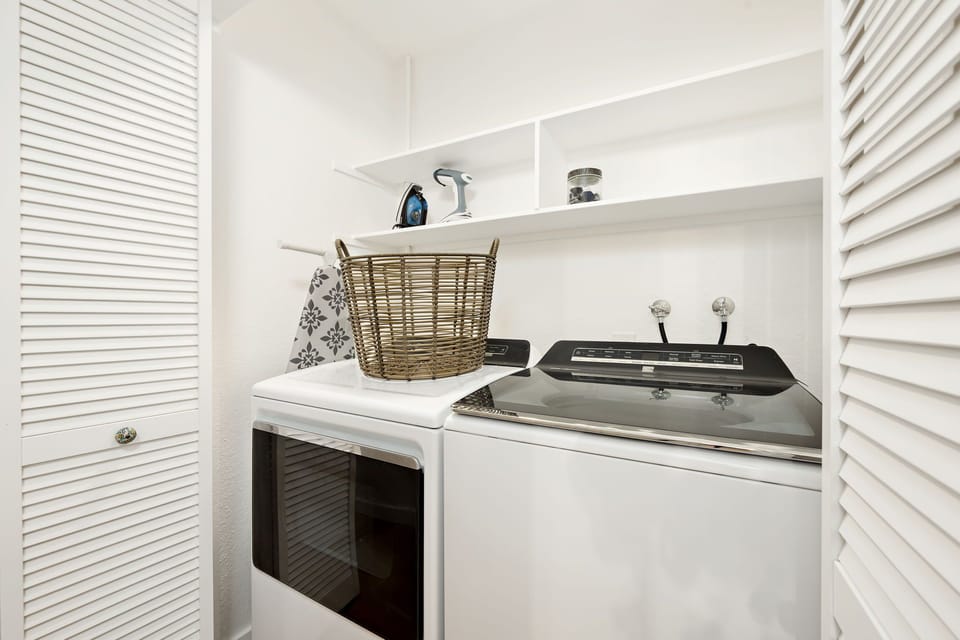 Washer, Dryer, Iron, Ironing board and  steamer is supplied