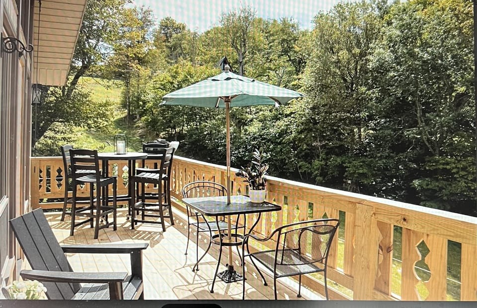 Enjoy al fresco dining with serene forest views.