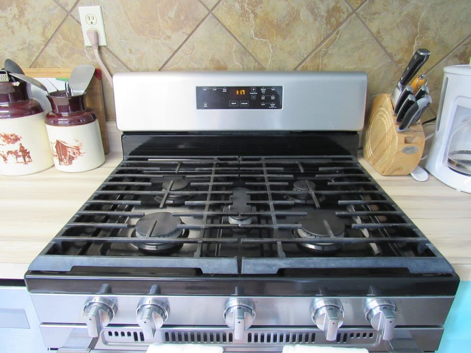 Gas-burning stove for cooking your own meals. 