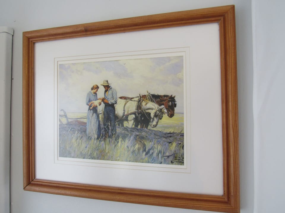 The cabin is full of Western art. 