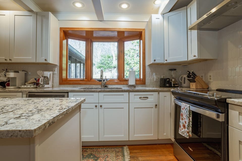 Kitchen is outfitted with an Electric Smooth Top Range