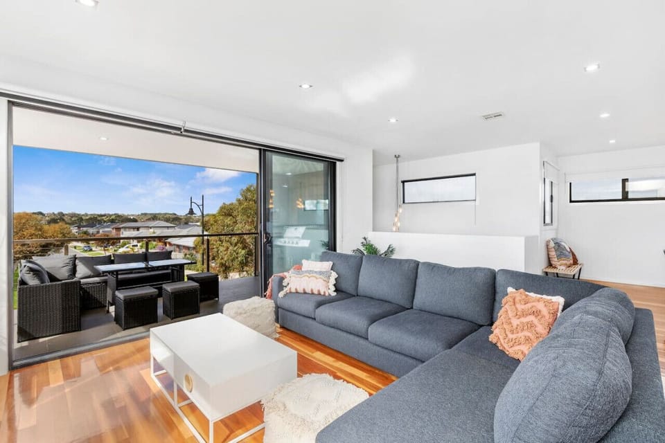 🌿 Seamless indoor-outdoor flow with a cozy living area and beautiful natural views