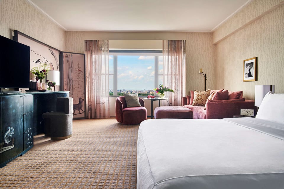 Unwind by the window with city views and plush seating.