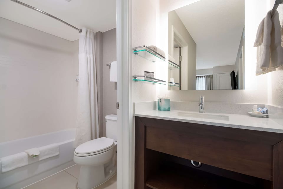 Soak and reset in a spotless bath with plush towels.