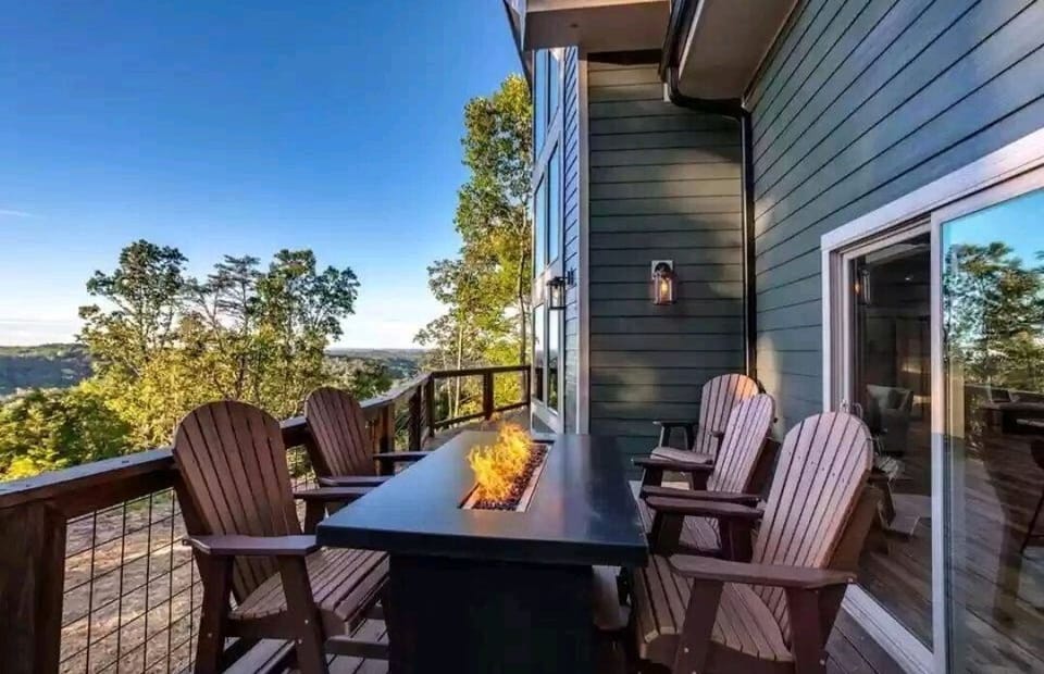 Fire table with seating on back deck.
