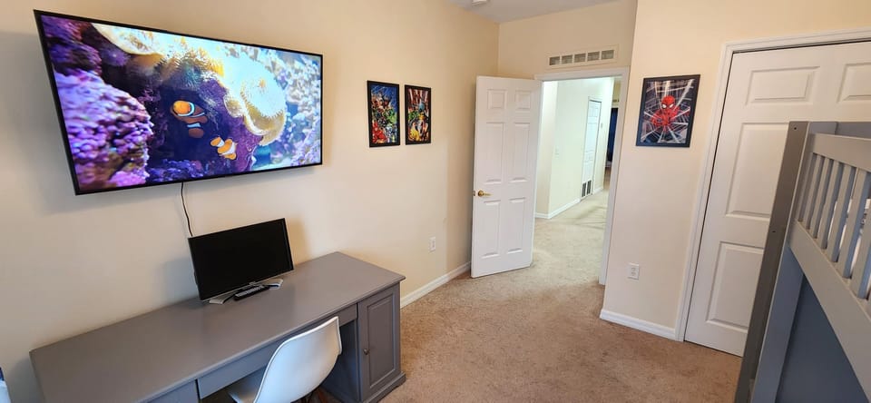 Room 2 - Fun space with bunk bed that sleeps 3.  Smart TV, desk and monitor.