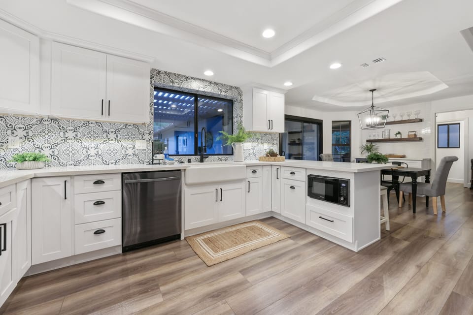 The kitchen has all new appliances and a farmhouse sink.