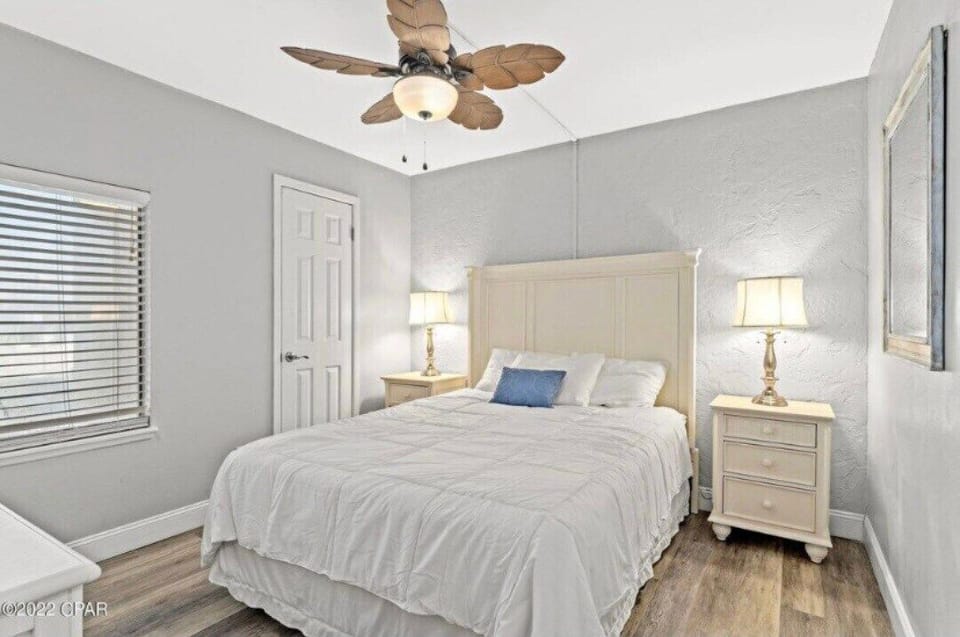 Room 2 on bottom floor with queen bed and attached full bathroom. 