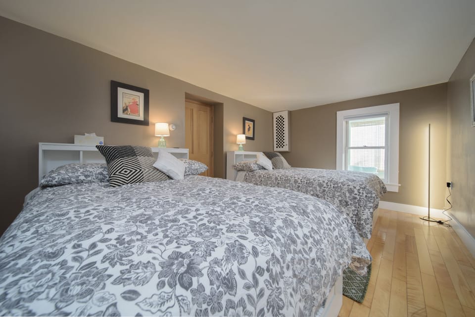 first floor bedroom with two full size beds