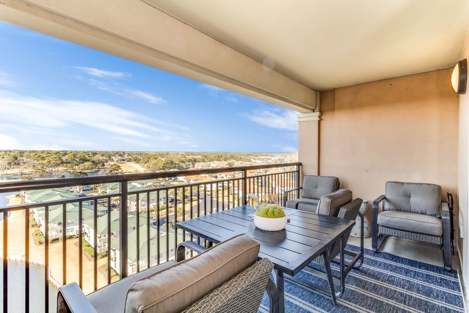 Your private balcony offers sweeping views while you dine al fresco or unwind in comfort with stylish outdoor seating.