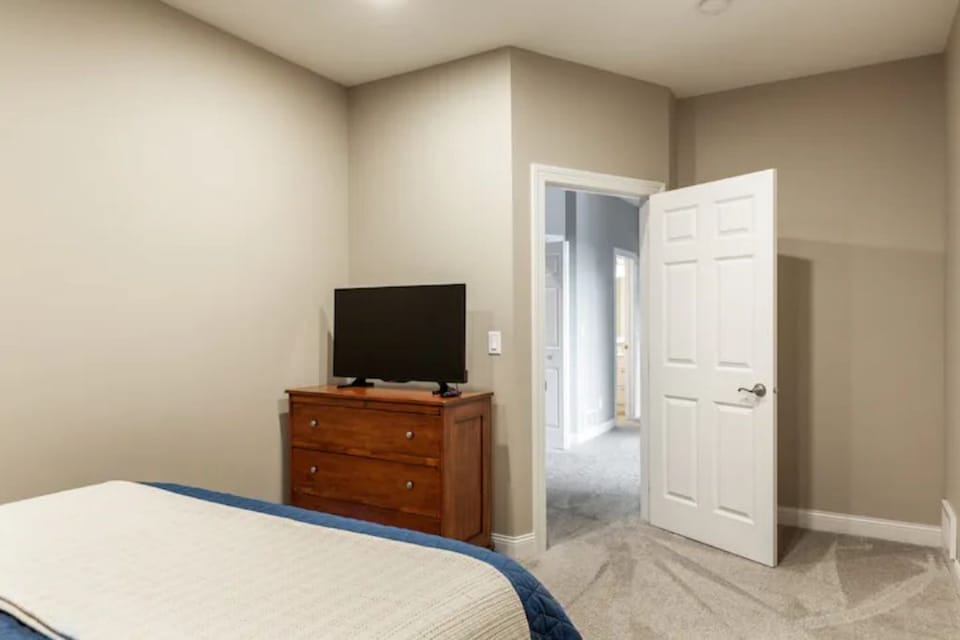 Another view of one of upstairs bedrooms.