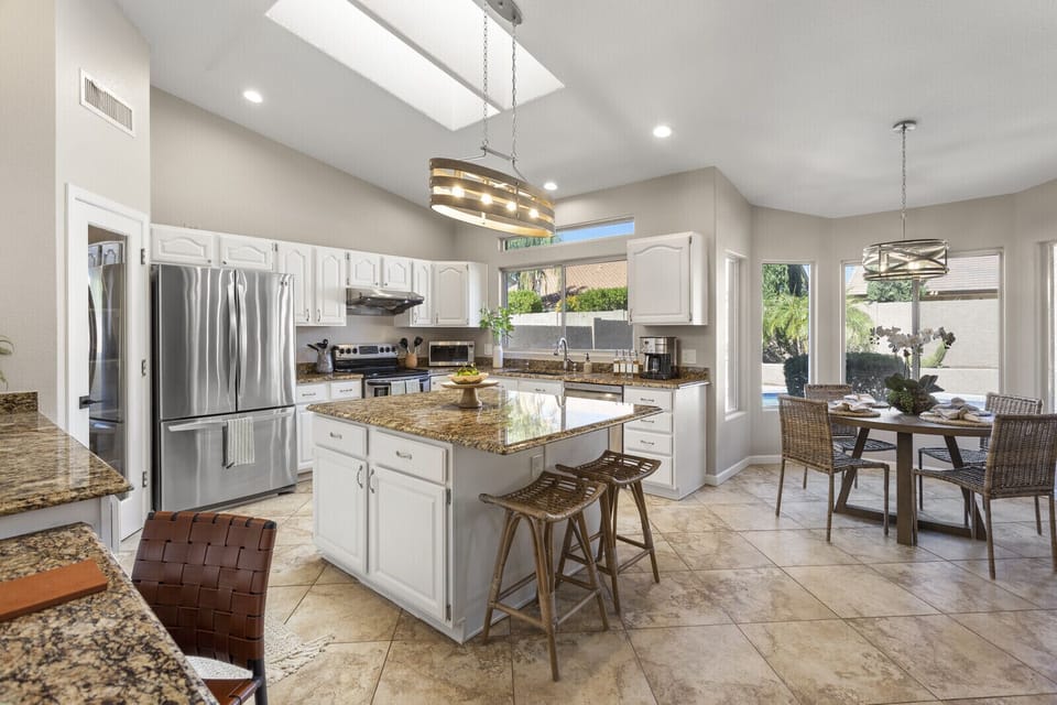 Fully stocked kitchen with skylights and breakfast nook