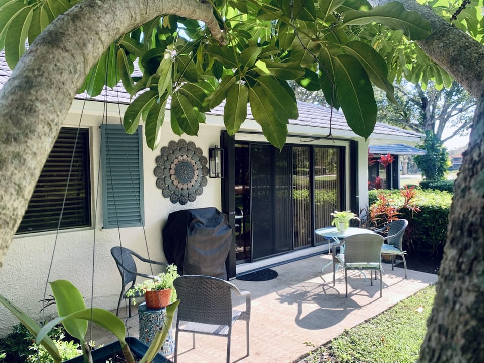 Private Terrace overlooking lawn and glorious mature trees.