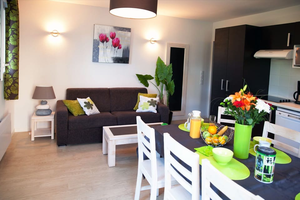 Loads of room at the dining table and the open concept is always nice for the cook.