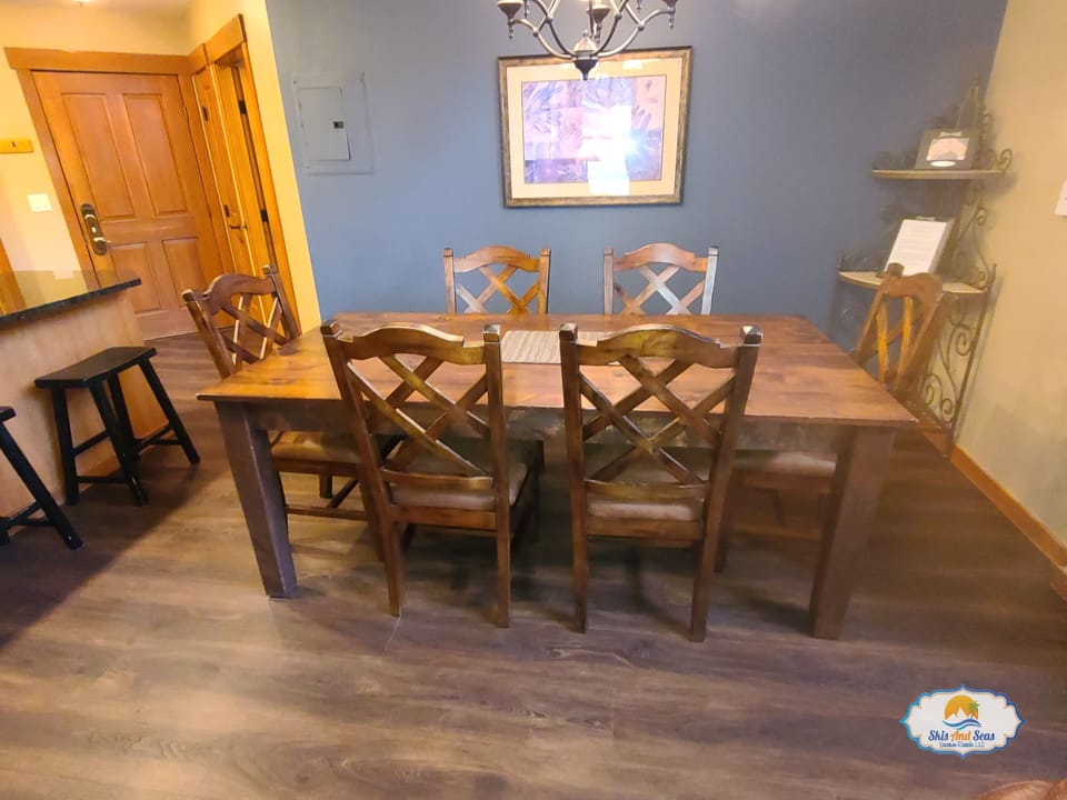 Dining room with fully furnished table and chairs