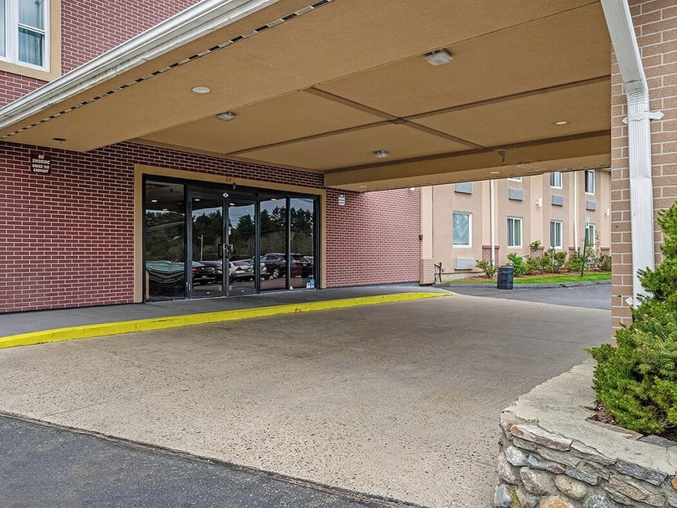 Arrive effortlessly under the covered entrance with easy parking.