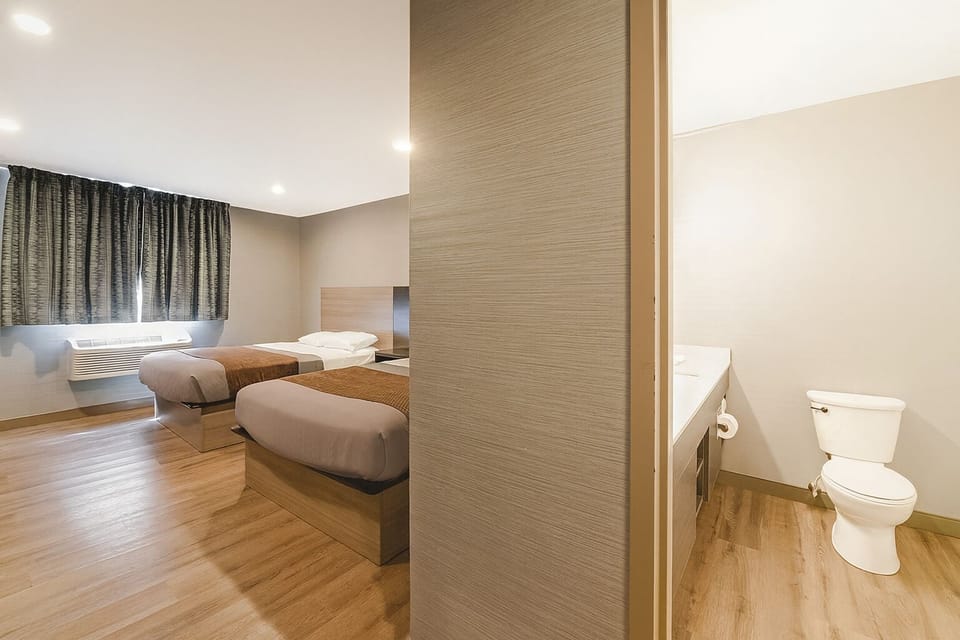 Freshen up easily with a clean, modern bath setup.