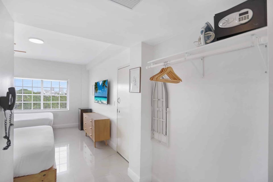 Feel at ease with in-room safe, iron, and storage.