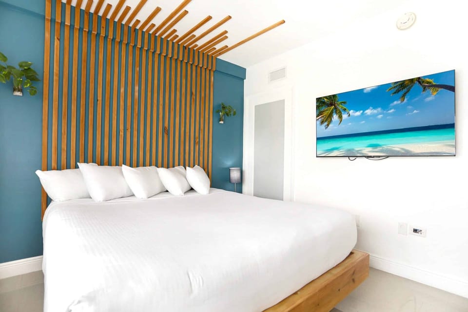 Kick back in bed and stream favorites on the big screen.
