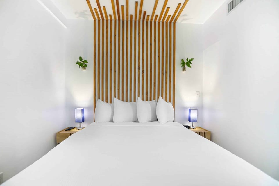 Recharge in a serene space with warm wood and soft light.