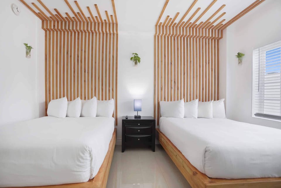Bedroom. Exact unit will be assigned upon arrival. Views, colors and decor may vary.