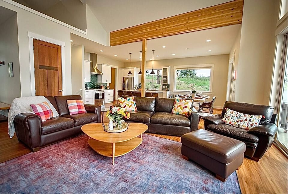 Main floor living room and open concept living, dining & kitchen