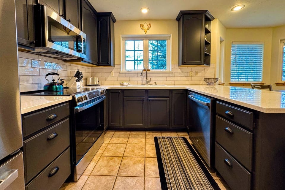 With new appliances and cabinets, this kitchen is ready for a family meal. 