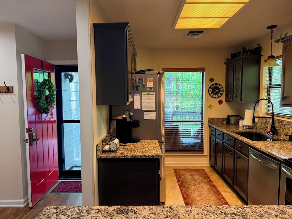 Beautiful kitchen right next to entrance.