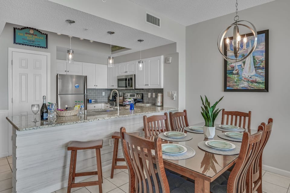 The dining table has room for the whole family! Enjoy a home cooked meal or some local take out while enjoying the sights and sounds of the Gulf.