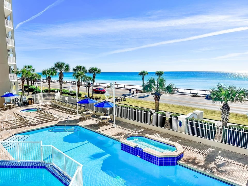 Majestic Sun has a large pool, two hot tubs on the elevated, and spacious patio with plenty of seating and shade overlooking the shimmering Gulf of Mexico.