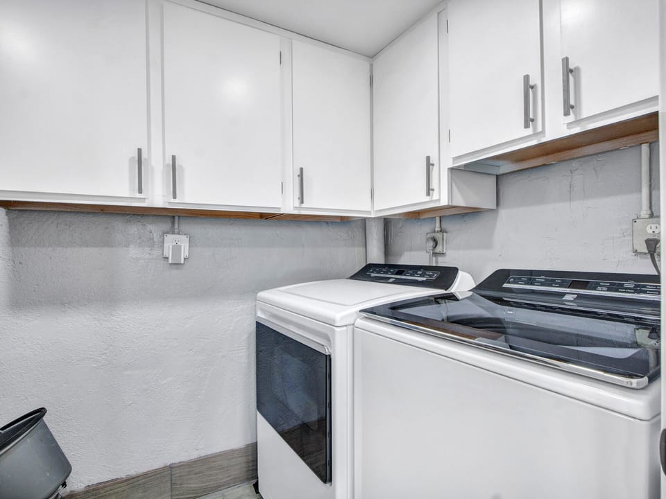 Full size, washer and dryer with startup laundry supplies provided