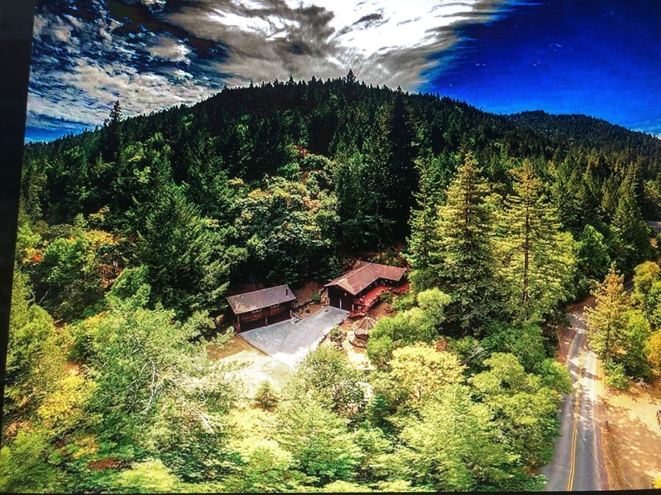 Aerial view of the guest house (L) and main house (R).